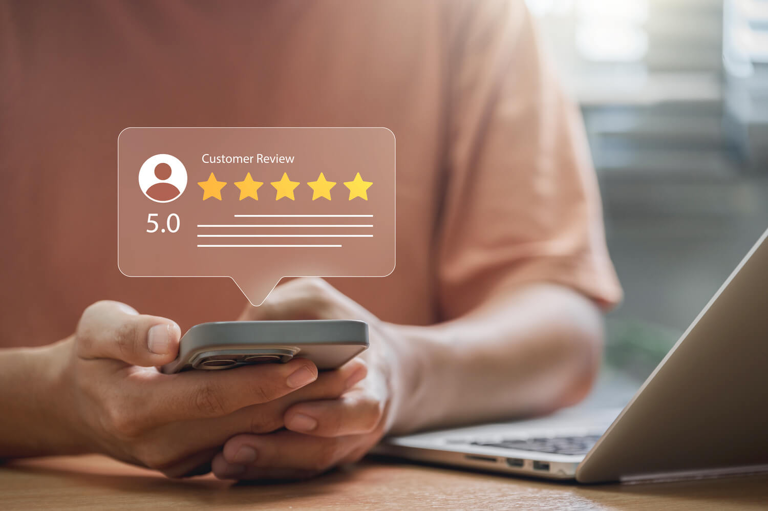 person leaving 5 star review on phone