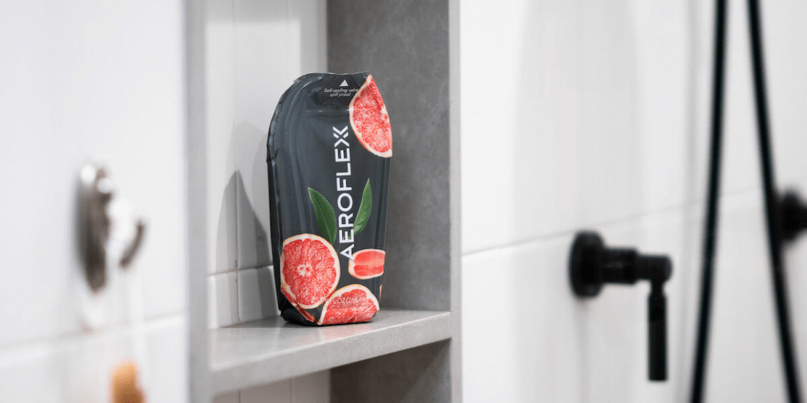 Aeroflexx package with grapefruit designs on a bathroom shelf.